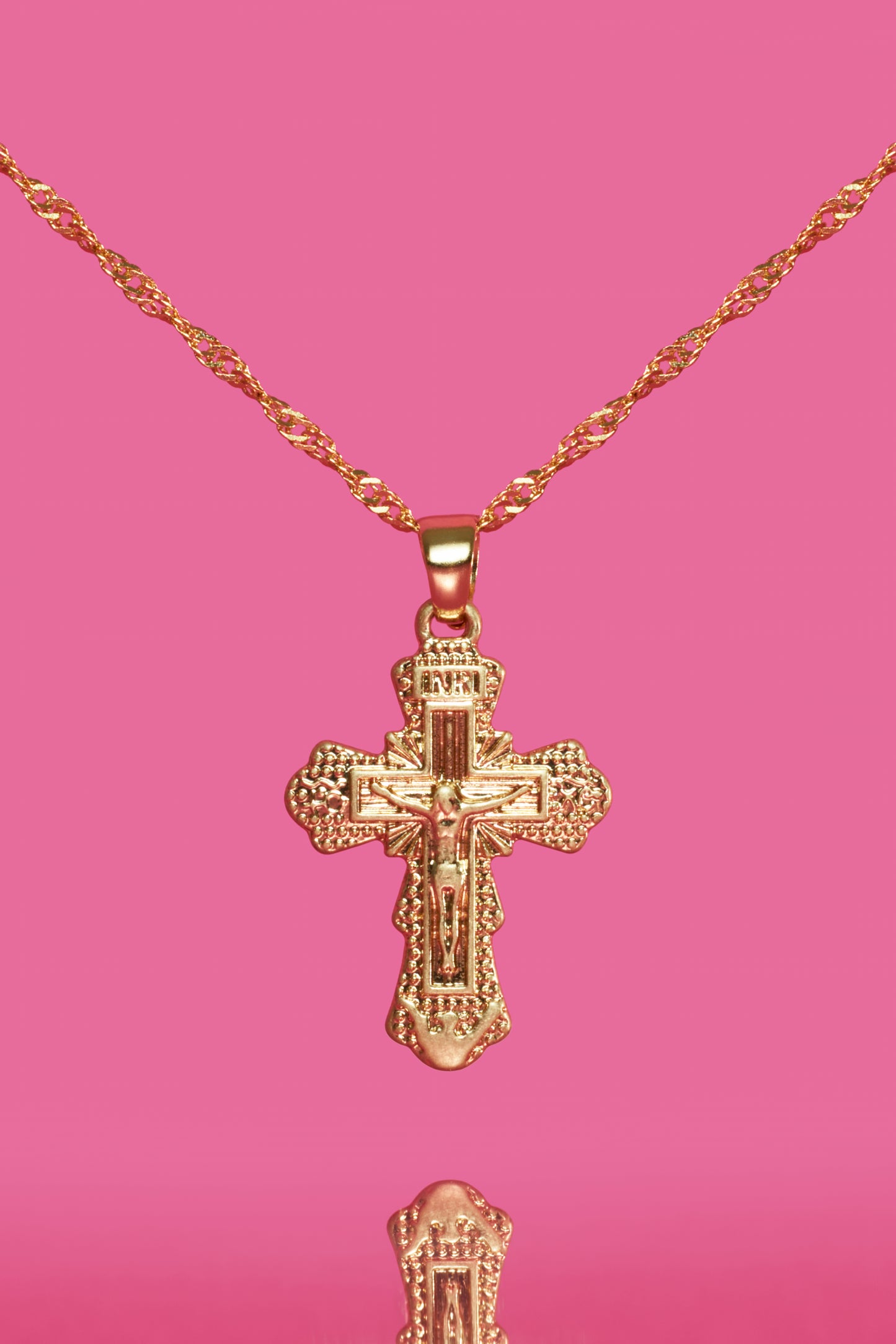 THE CROSS NECKLACE
