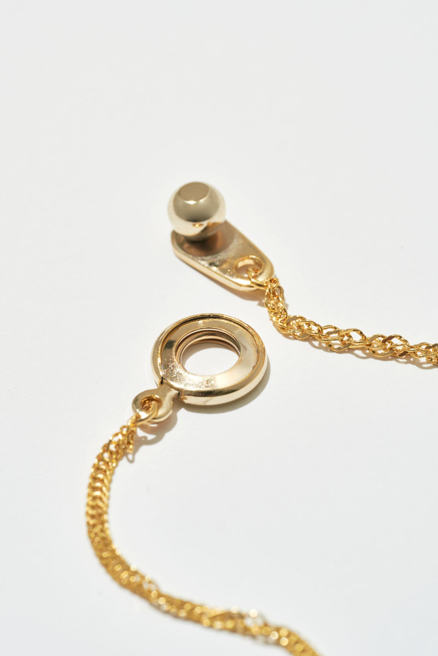 THE CROSS NECKLACE