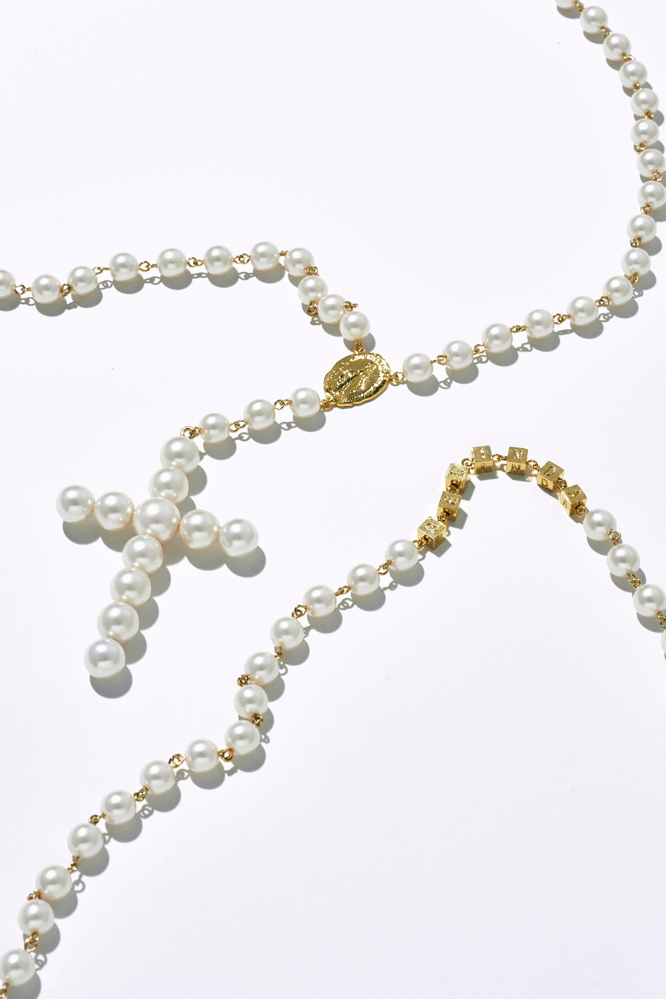 THE CROSS PEARL NECKLACE