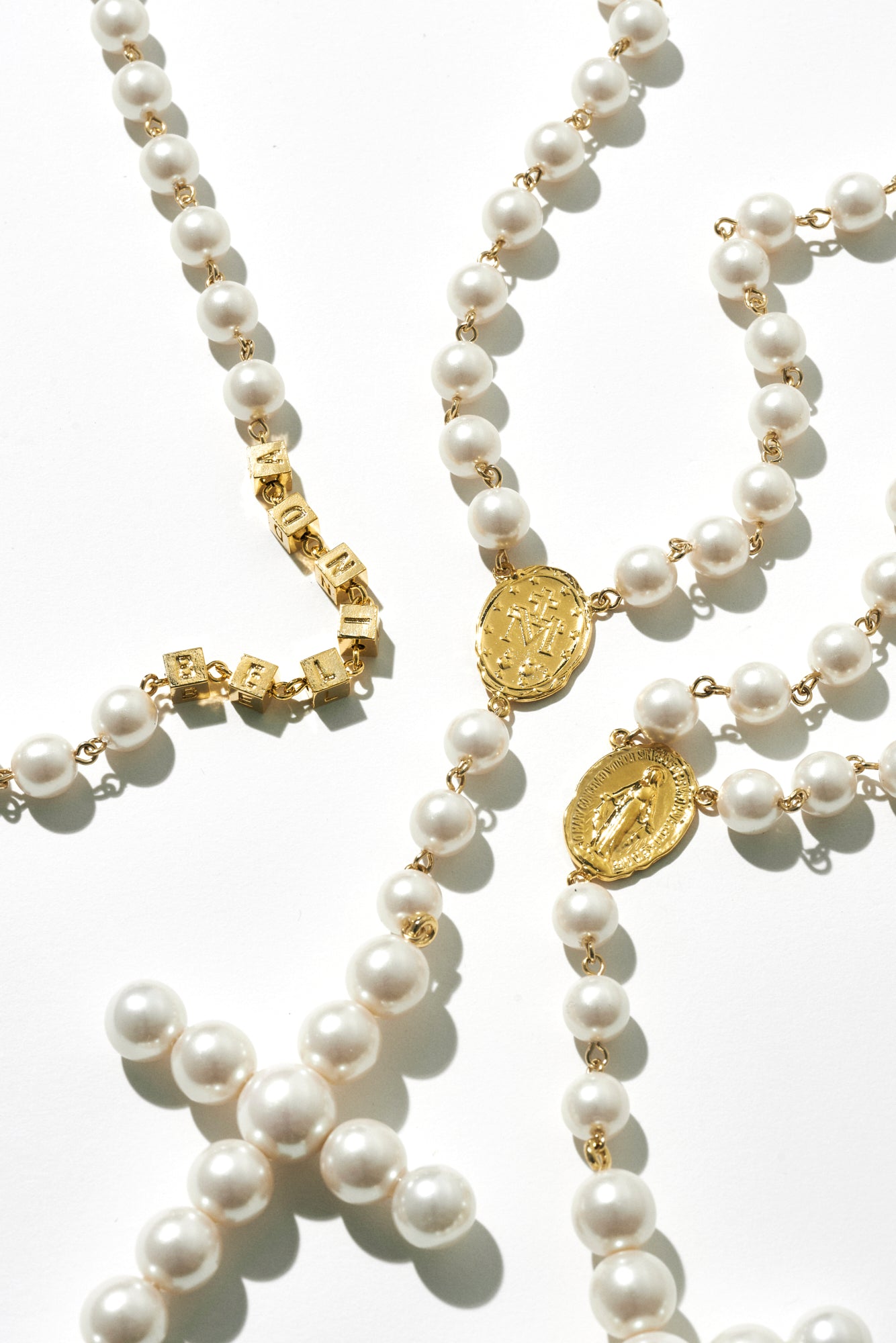 THE CROSS PEARL NECKLACE